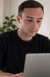 Editorial visualisation of Alvaro working at a laptop